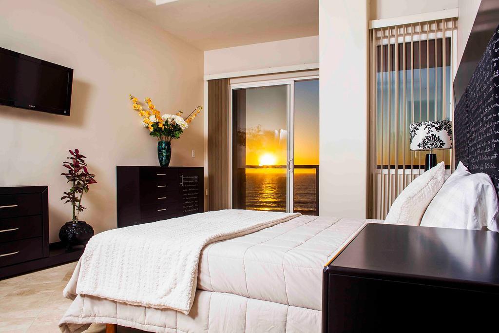 Playa Bonita Luxury Suites Розаріто Номер фото